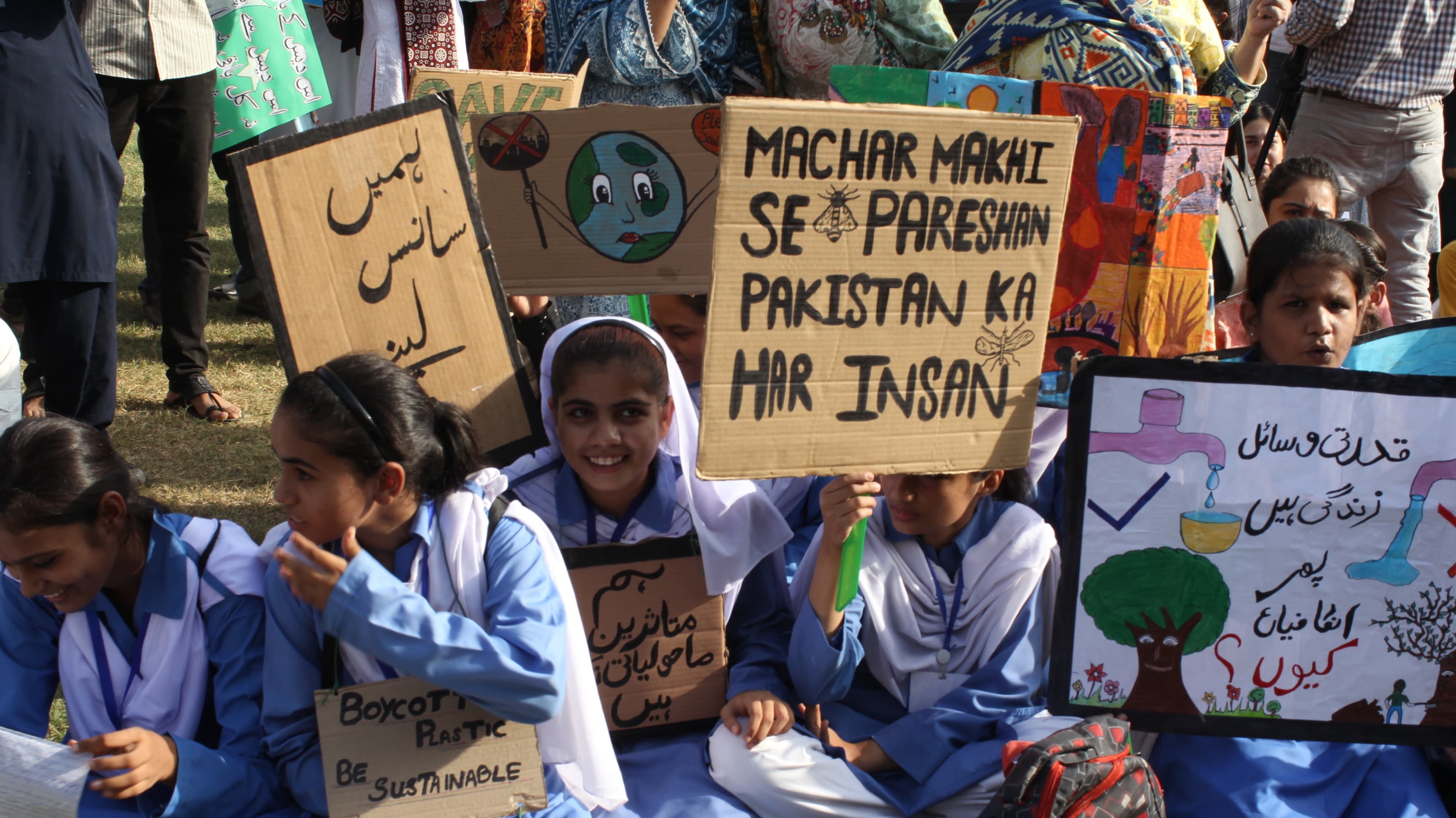 Students at the climate march in Karachi on Friday. — Photo by Kamran Nafees