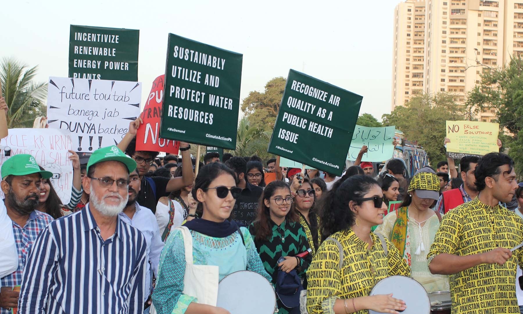 Attendees at the climate march in Karachi. — Photo by Kamran Nafees