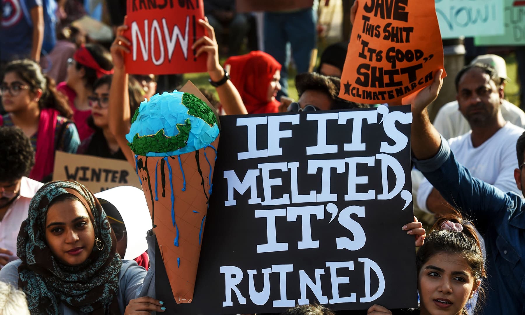 Youths participate in a march in Islamabad for a climate strike to protest against governmental inaction towards climate breakdown.— AFP