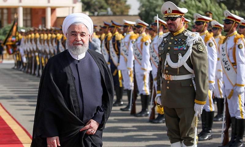 A handout picture provided by the Iranian presidency on September 23, 2019 shows President Rouhani attending a farewell ceremony at the Mehrabad airport in Tehran, shortly before leaving Tehran for the UN General Assembly in New York. — AFP