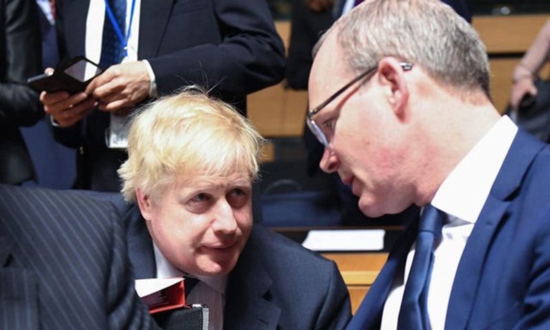 British Prime Minister Boris Johnson and Irish Foreign Minister Simon Coveney. — AFP/File