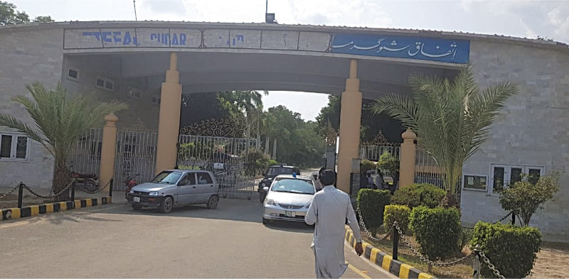 SAHIWAL: Vehicles coming out of the Ittefaq Sugar Mills on Saturday.—Dawn