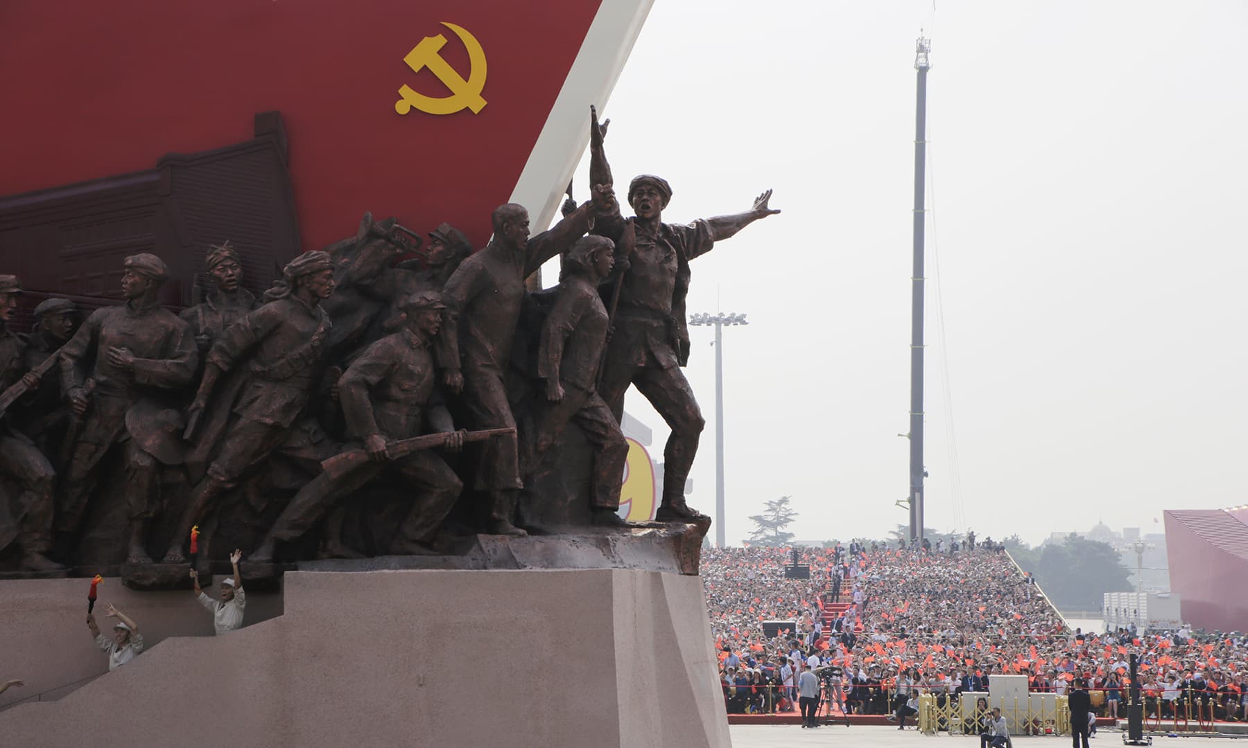 A float featuring the Communist Party of China travels past Tiananmen Square in Beijing during the parade. — Reuters