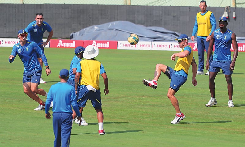 VISAKHAPATNAM: South African cricketers play football during a practice session on Tuesday.--AP