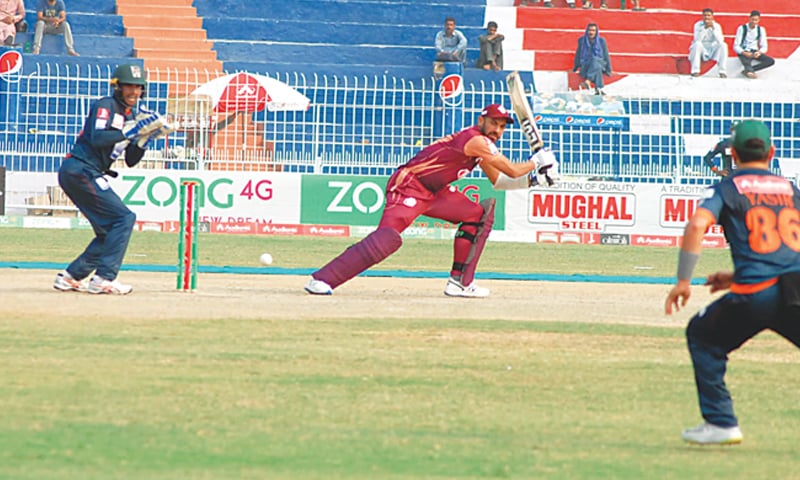 FAISALABAD: Southern Punjab’s Wahab Riaz cuts as Balochistan wicket-keeper Bismillah Khan looks on during the National T20 Cup First XI match at the Iqbal Stadium on Thursday.—INP FAISALABAD: Southern Punjab’s Wahab Riaz cuts as Balochistan wicket-keeper Bismillah Khan looks on during the National T20 Cup First XI match at the Iqbal Stadium on Thursday.—INP