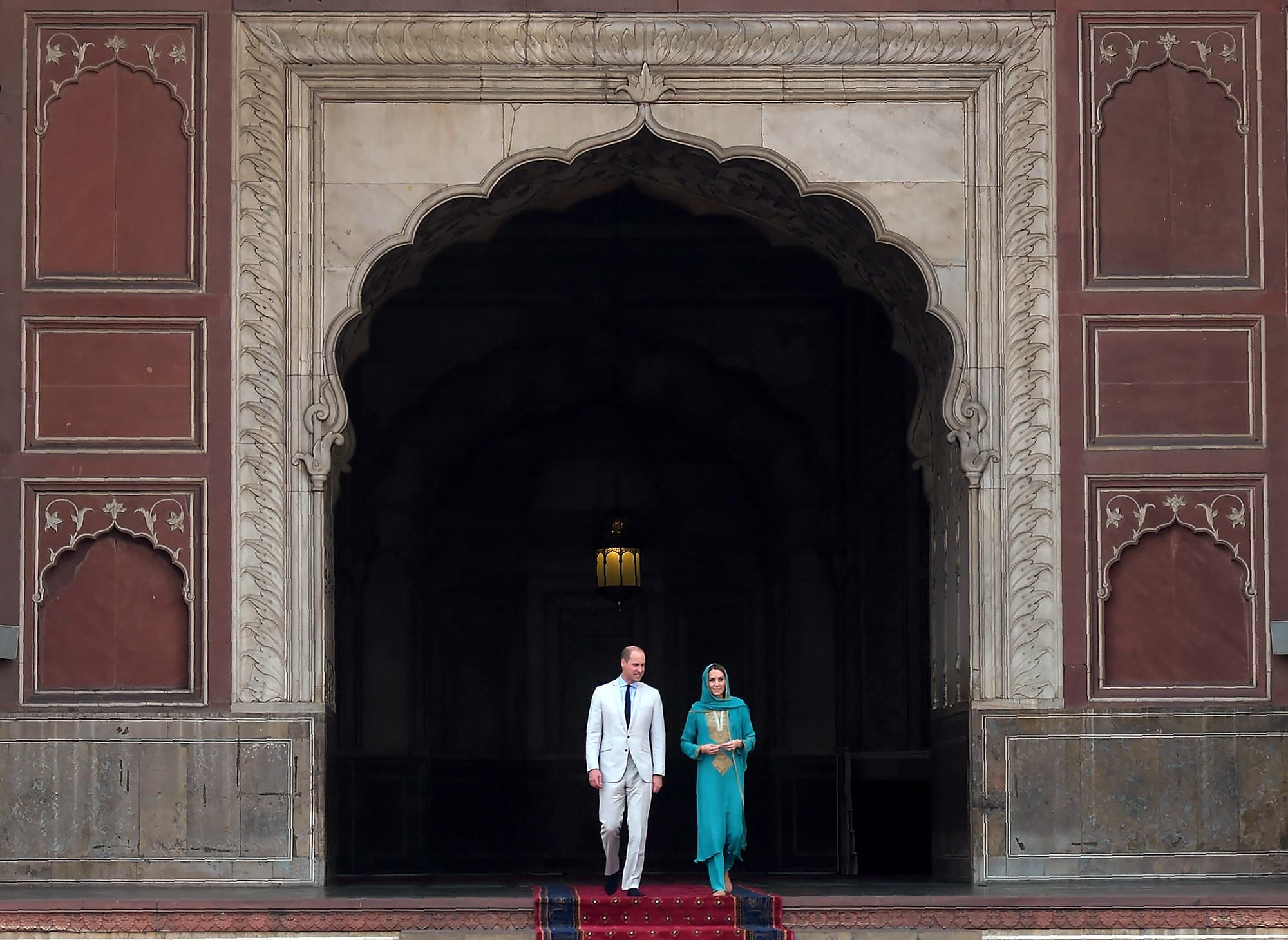 Britain's Prince William, Duke of Cambridge and his wife Catherine, Duchess of Cambridge visit the historical Badshahi mosque in Lahore on October 17. — AFP