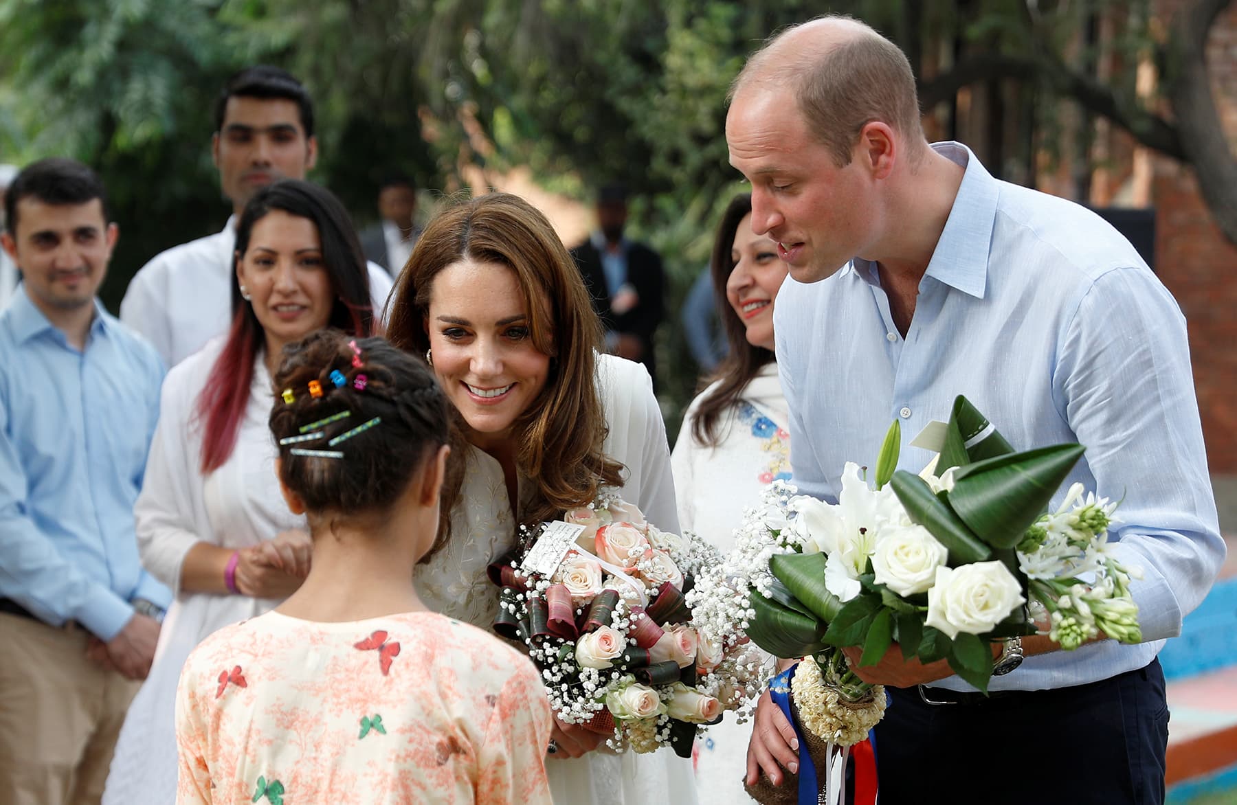 Britain's Prince William and Catherine, Duchess of Cambridge, visit SOS Children's village in Lahore, October 17. — Reuters