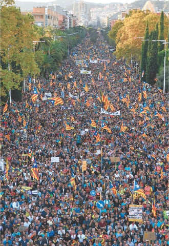 Barcelona: People gather during a pro-independence demonstration called by Catalan National Assembly (ANC) and Omnium Cultural organisations against the conviction of Catalan separatist leaders for the 2017 attempted secession on Saturday.—AFP