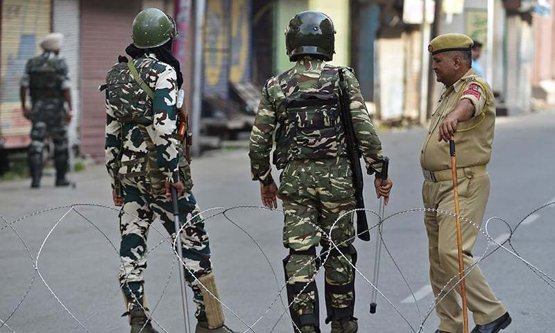 Indian paramilitary troopers stand guard during a lockdown in Srinagar on September 6, 2019. — AFP/File