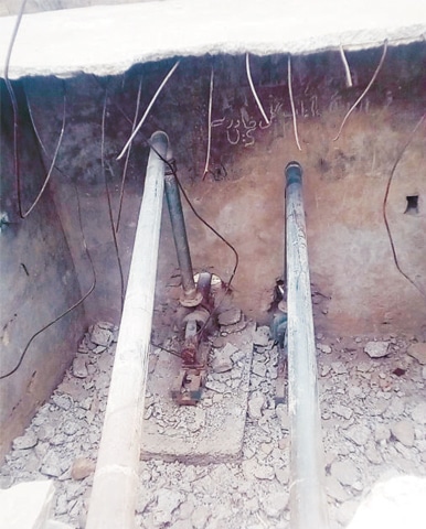 An out-of-order tube-well in Manda Khel village, Kohat. — Dawn