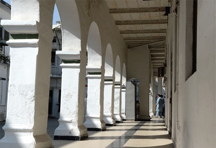 Arches in the backyard of the building. Earlier, they opened to the lawns that have vanished after more offices were built. — Photos by Mohammad Asim