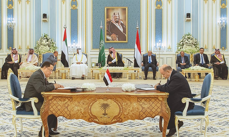 RIYADH: A handout picture shows (centre behind, left to right) Abu Dhabi Crown Prince Sheikh Mohamed bin Zayed al Nahyan, Saudi Crown Prince Mohammed bin Salman and Yemen&rsquo;s President Abd-Rabbu Mansour Hadi at the signing ceremony.&mdash;AFP
