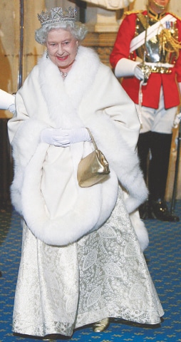 London: This Nov 8, 2009, file photo shows Queen Elizabeth leaving the Houses of Parliament after her speech for the legislature’s opening.—AP