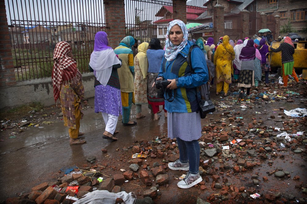 Kashmiri photojournalist Masrat Zahra stands for a photograph during a protest on the outskirts of Srinagar. "I’ll kick you with my boots and take you to the governor’s house," a policeman told Zahra as she covered the first Friday protest since the Aug 5 lockdown. ─ AP