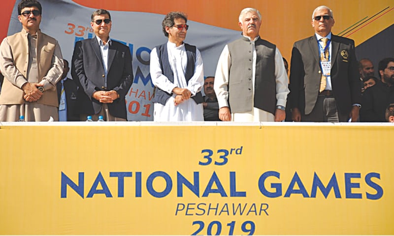 CHIEF Minister Khyber Pakhtunkhwa Mahmood Khan, Corps Commander Peshawar Lt Gen Shaheen Mazhar Mehmood, Senior Minister Atif Khan and Pakistan Olympic Association President retired Lt Gen Arif Hasan are seen at the opening ceremony of the National Games. CHIEF Minister Khyber Pakhtunkhwa Mahmood Khan, Corps Commander Peshawar Lt Gen Shaheen Mazhar Mehmood, Senior Minister Atif Khan and Pakistan Olympic Association President retired Lt Gen Arif Hasan are seen at the opening ceremony of the National Games.