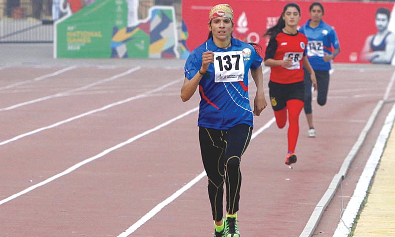 ATHLETES in action during a track event at the Qayyum Stadium.&mdash;PPI