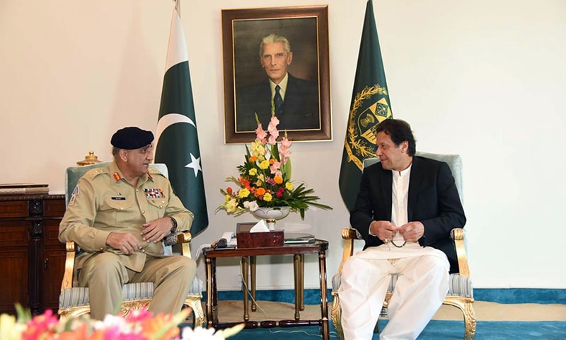 General Qamar Bajwa meets Prime Minister Imran Khan at PM House on November 15. — PID