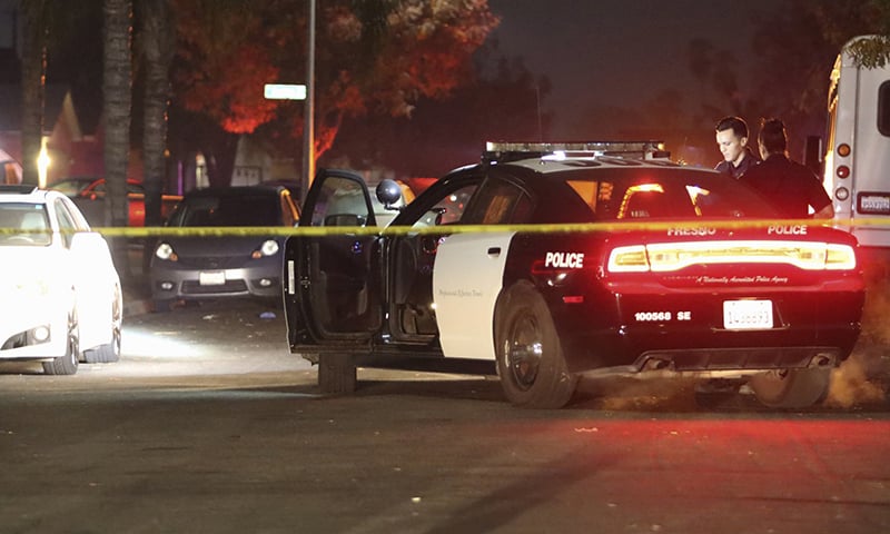 Police work at the scene of a shooting on Sunday, November 17, 2019, in southeast Fresno in California. &mdash; AP