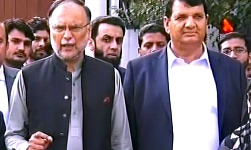 PML-N leader Ahsan Iqbal talking to reporters in Lahore on Monday. — DawnNewsTV