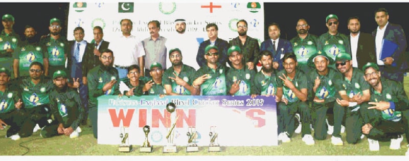 AJMAN: Members of Pakistan’s blind cricket squad pose for a group photo with the winners trophy after completing the whitewash of England.