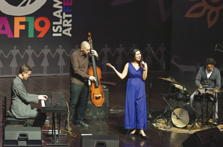 Jazz band Cyminology, comprising vocalist Cymin Samawatie, Benedikt Jahnel on piano, Ralf Schwarz on  double bass and Ketan Bhatti on drums, perform at the PNCA in Islamabad on Tuesday. &mdash; Photo by Tanveer Shahzad