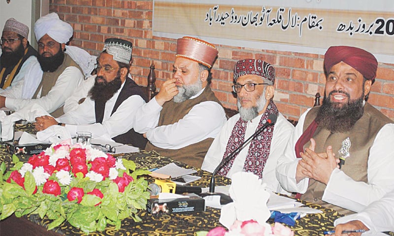 Sunni Tehreek chief Sarwat Ejaz Qadri gestures during the conference as other leaders listen.—Online Sunni Tehreek chief Sarwat Ejaz Qadri gestures during the conference as other leaders listen.—Online