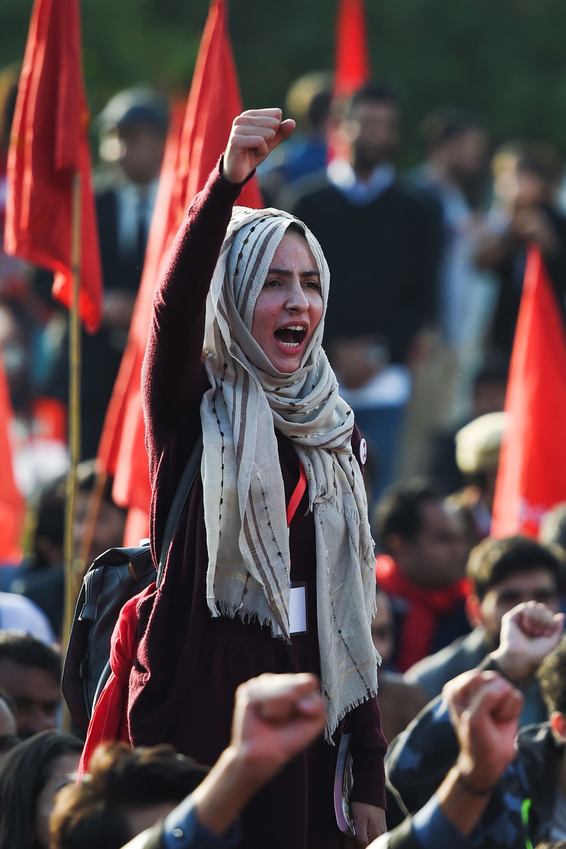 A girl shouts slogans during the protest rally in Islamabad on Friday. — AFP