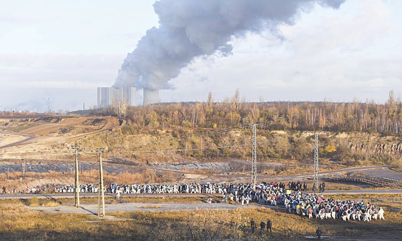 Leipzig (Germany): Supporters of the climate movement Ende Gelaende protest at the coal-fired power station Lippendorf on Saturday.&mdash;AP