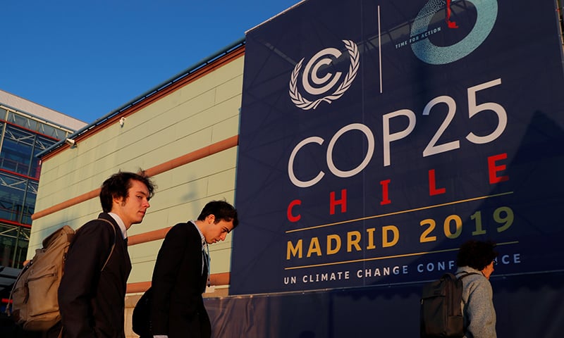 Participants enter the UN climate change conference (COP25) in Madrid, Spain. — Reuters