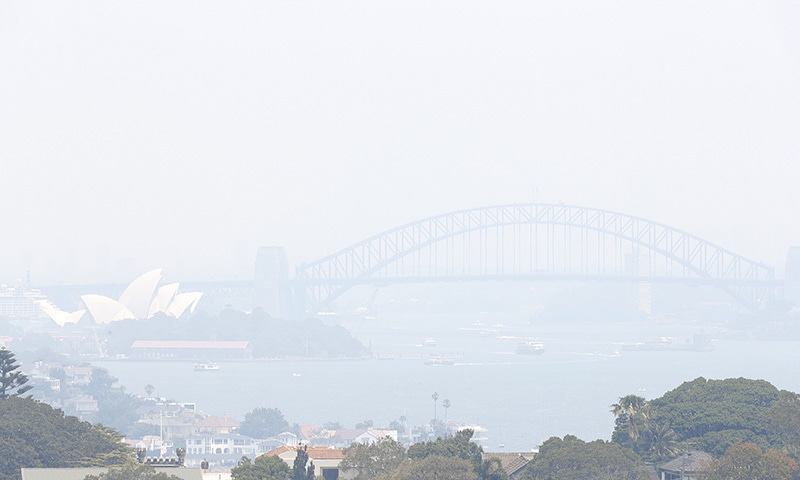 In this Tuesday, Dec. 3 file photo, smoke haze from wildfires fills the skyline in Sydney, Australia. — AP