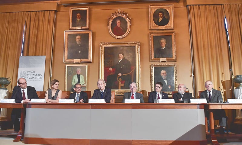 Stockholm: Laureates in Economic Sciences Michael Kremer, Esther Duflo and Abhijit Banerjee, Chemistry Laureates Akira Yoshino and Stanley Whittingham and Physics Laureates Didier Queloz, Michel Mayor and James Peebles attend a press conference at The Royal Swedish Academy of Sciences on Saturday.—AFP
