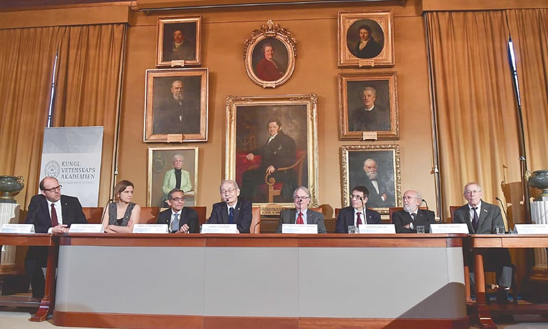 Stockholm: Laureates in Economic Sciences Michael Kremer, Esther Duflo and Abhijit Banerjee, Chemistry Laureates Akira Yoshino and  Stanley Whittingham and Physics Laureates Didier Queloz, Michel Mayor and James Peebles attend a press conference at The Royal Swedish Academy of Sciences on Saturday.—AFP