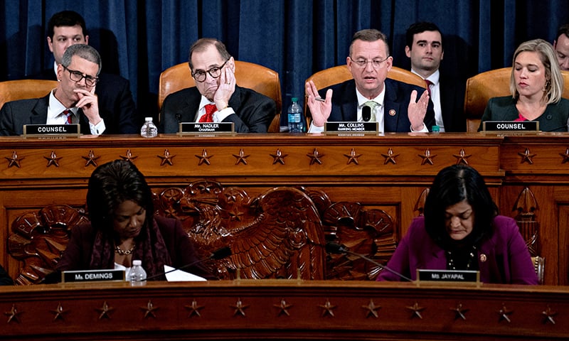 Representative Doug Collins, a Republican from Georgia and ranking member of the House Judiciary Committee, second right, speaks as chairman Representative Jerry Nadler, a Democrat from New York, listens during a hearing in Washington, DC, US, on December 12. &mdash; Reuters