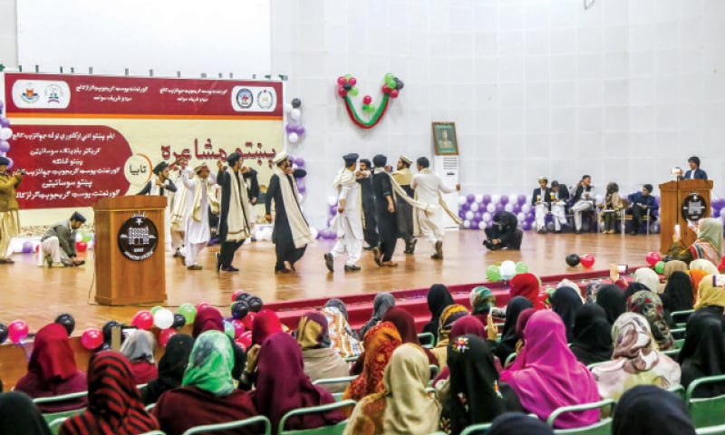 Students of Jahanzeb College dance during the annual poetry recitation session in Wadudia Hall, Swat. — Dawn Students of Jahanzeb College dance during the annual poetry recitation session in Wadudia Hall, Swat. — Dawn