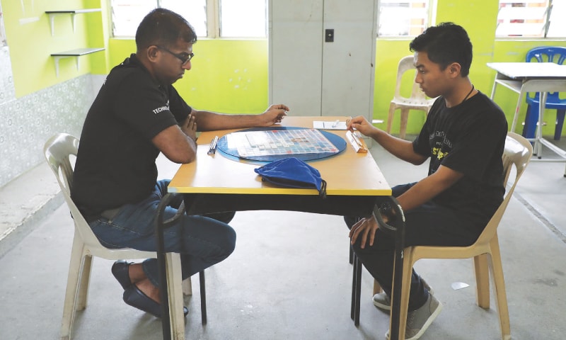 Tengku Ariff Shah (right) and his coach Ganesh Asirvatham practise before the WESPA Youth Cup 2019 in Kuala Lumpur.—Reuters Tengku Ariff Shah (right) and his coach Ganesh Asirvatham practise before the WESPA Youth Cup 2019 in Kuala Lumpur.—Reuters