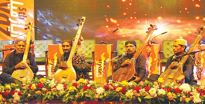 BHITAI’S raagis present wai at the inauguration of the fifth Ayaz Melo at Sindh Museum on Saturday.—Online