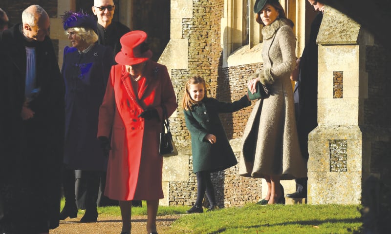 NORFOLK: Queen Elizabeth II, Princess Charlotte of Cambridge and Catherine, Duchess of Cambridge, leave after the royal family&rsquo;s traditional Christmas Day service at St Mary Magdalene Church in Sandringham on Wednesday.&mdash;AFP