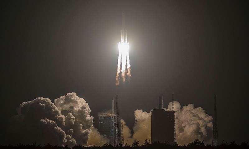 China's heavy-lift Long March 5 rocket blasts off from its launch centre in Wenchang, south China's Hainan province on December 27. — AFP