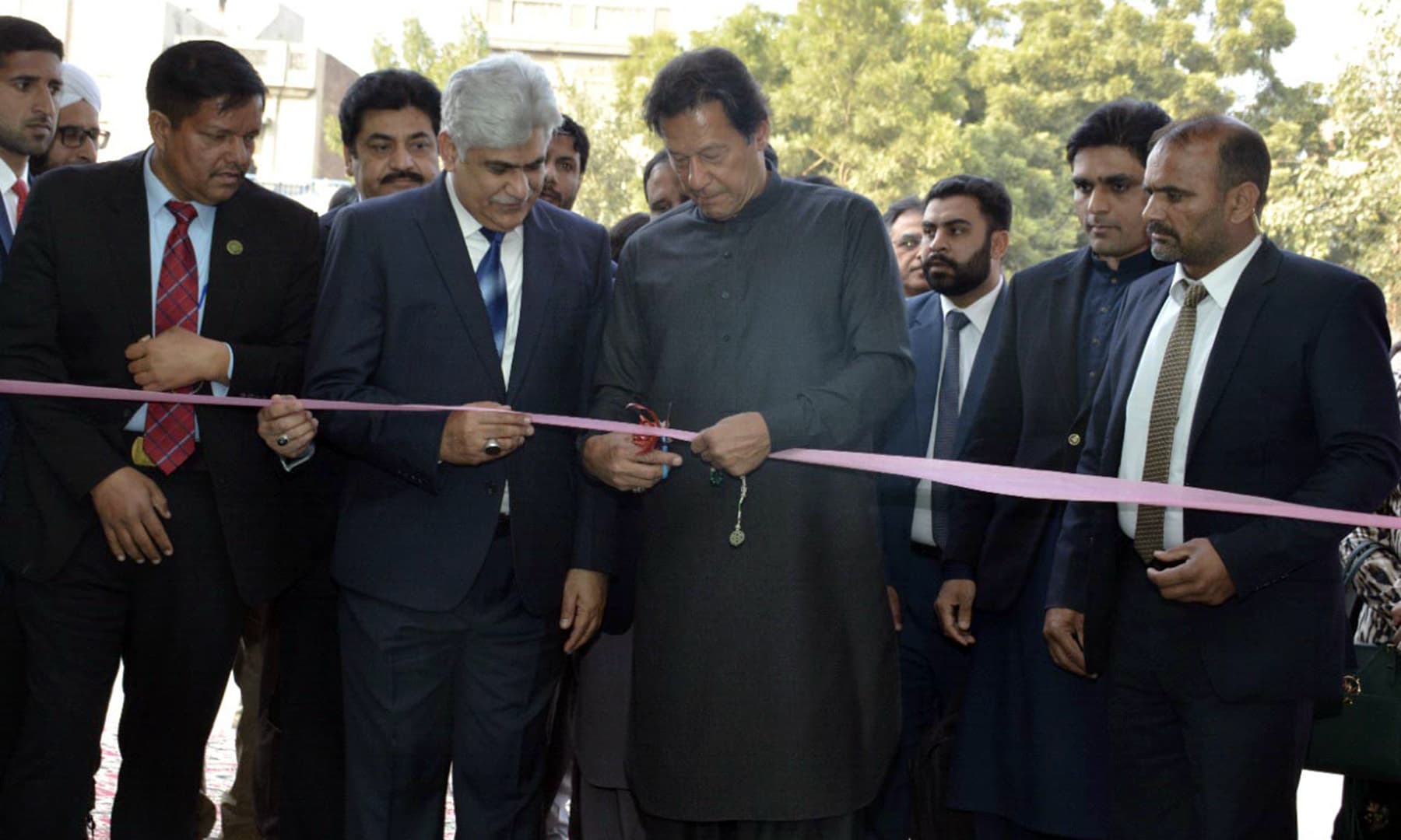 Prime Minister Imran Khan on Friday inaugurating Panahgah in Faisalabad on Friday. — PID