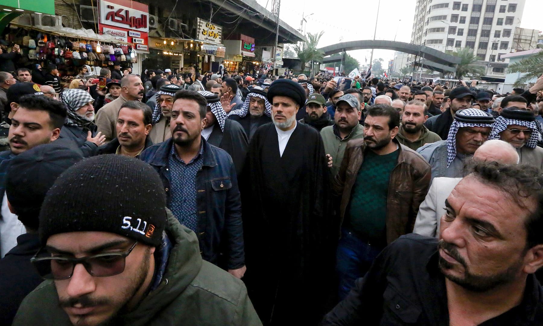 Mohammed al-Tabatabai (C), deputy Secretary General of the Asaib Ahl al-Haq faction, attends the funeral of Iraqi paramilitary chief Abu Mahdi al-Muhandis and Iranian military commander Qasem Soleimani, in Kadhimiya, Baghdad, on Saturday. — AFP