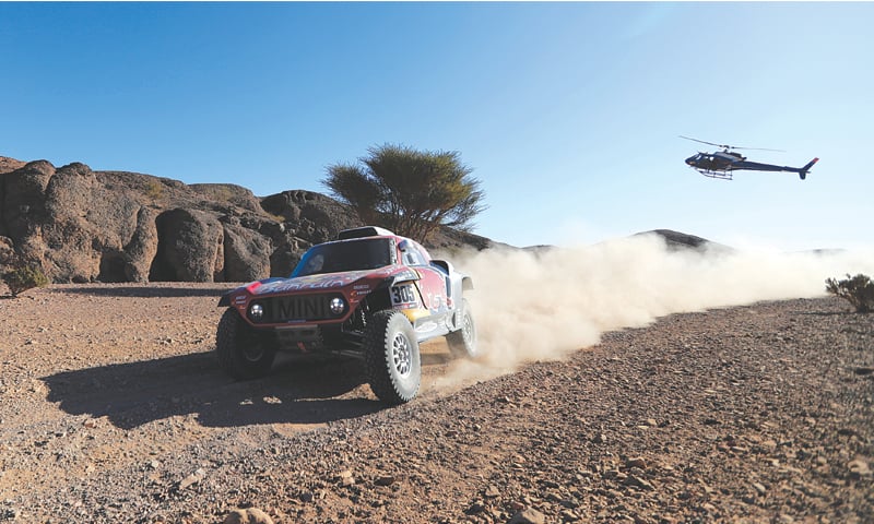 BAHRAIN JCW X-Raid Team car driven by Carlos Sainz and Lucas Cruz in action during the second stage of the Dakar Rally from Al Wajh to Neom.—Reuters BAHRAIN JCW X-Raid Team car driven by Carlos Sainz and Lucas Cruz in action during the second stage of the Dakar Rally from Al Wajh to Neom.—Reuters