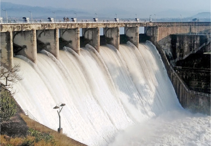 Water gushes out of Rawal Dam after its spillways were opened on Tuesday. — White Star