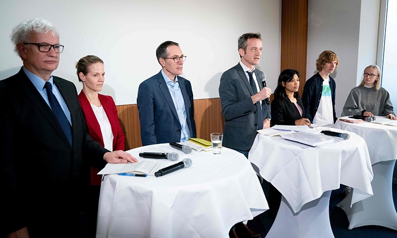 Lawyer Remo Klinger (C) speaks during a press conference organised by Greenpeace and other NGOs about climate lawsuit against German government on January 15 in Berlin. — AFP