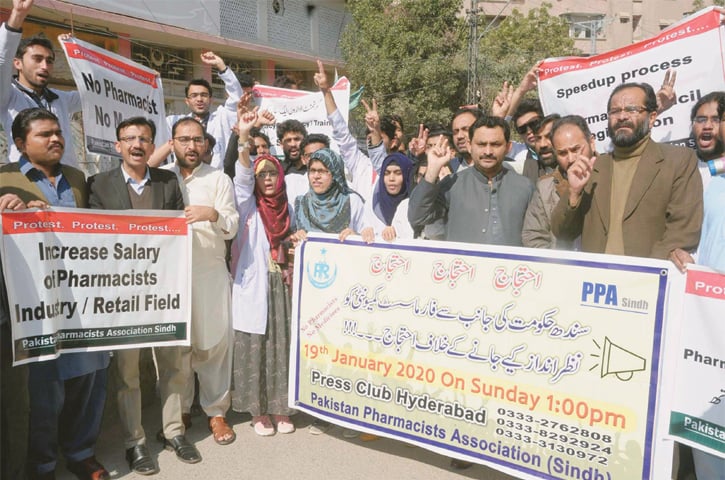 PHARMACISTS hold a demonstration outside the Hyderabad Press Club on Sunday.—PPI