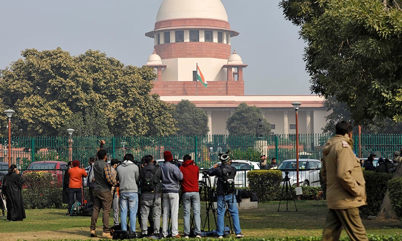 Television journalists are seen outside the premises of the Supreme Court in New Delhi, India on January 22, 2020. — Reuters