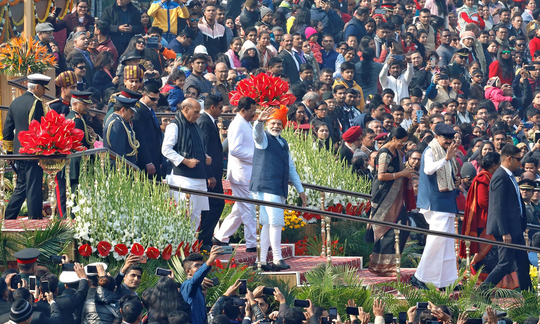 India's Prime Minister Narendra Modi waves to the crowd after attending Republic Day parade in New Delhi. — Reuters