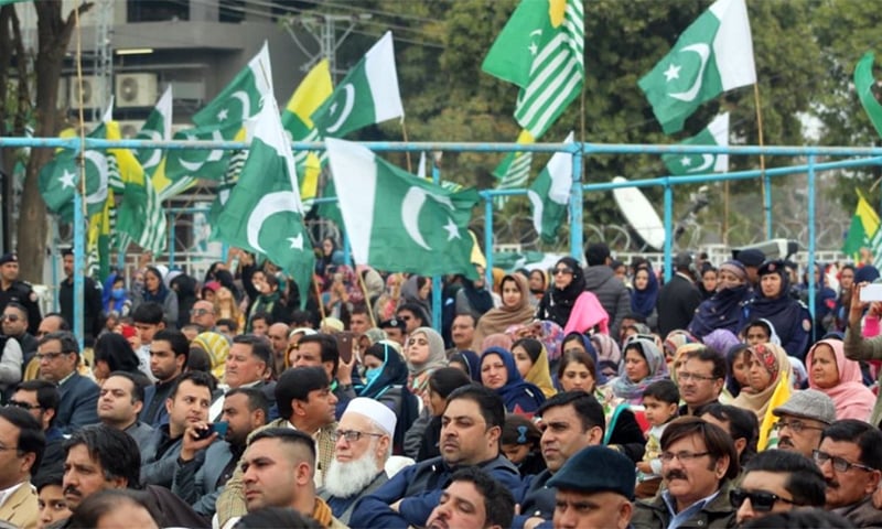 Rally participants listening to the premier's address in Mirpur on Thursday. — Photo courtesy PM Office Twitter