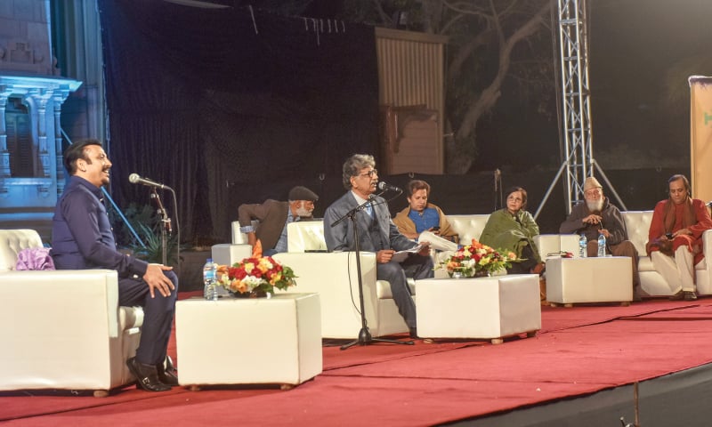 Dr Kabir Athar recites his verses at the mushaira hosted by MQM-P leader Faisal Sabzwari on Saturday.&mdash;Fahim Siddiqi / White Star