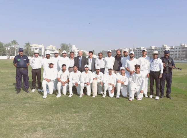 FORMER Pakistan skipper Sarfraz Ahmed (standing, fifth from left) and ex-KCCA president Prof Ejaz Ahmed Faruqi (seventh from left) pose with members of Pakistan CC and other officials at the KCCA Stadium.