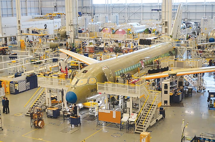 An Airbus A220 passenger jet stands in the final assembly line in Mirabel near Montreal, Quebec, Canada on January 14, 2019.—Reuters